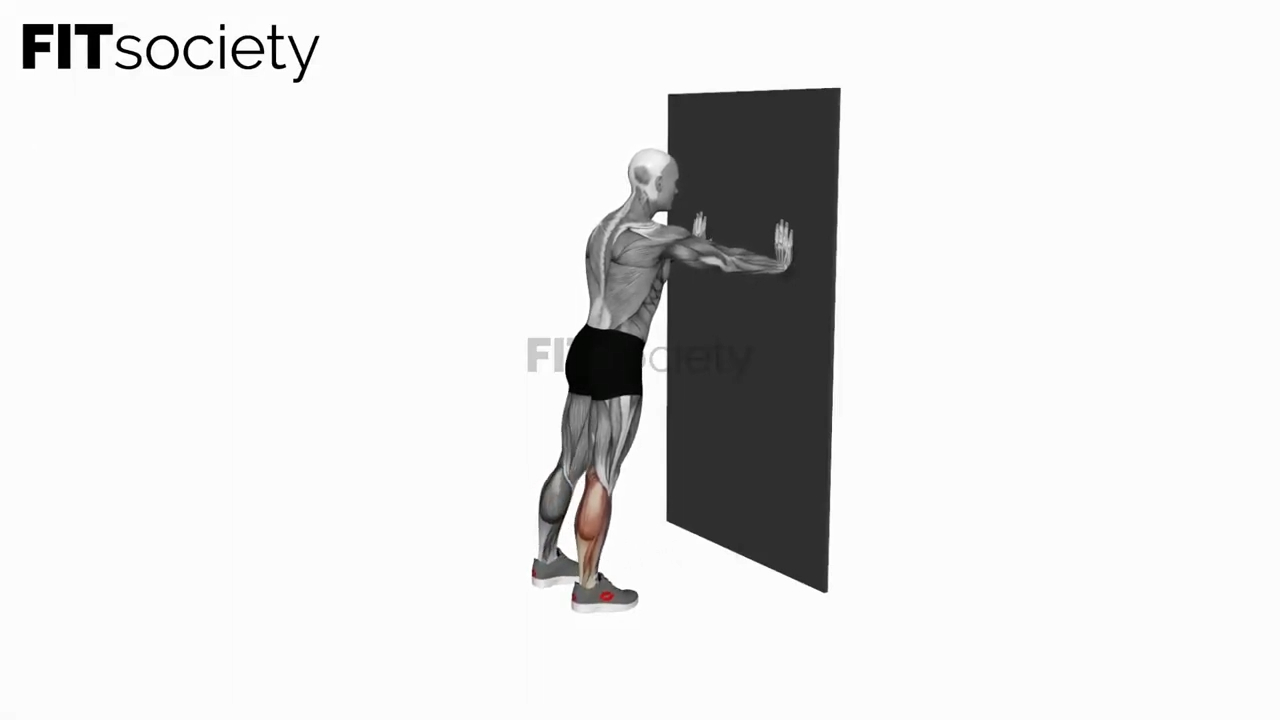Wadenstretch mit den Händen an der Wand
