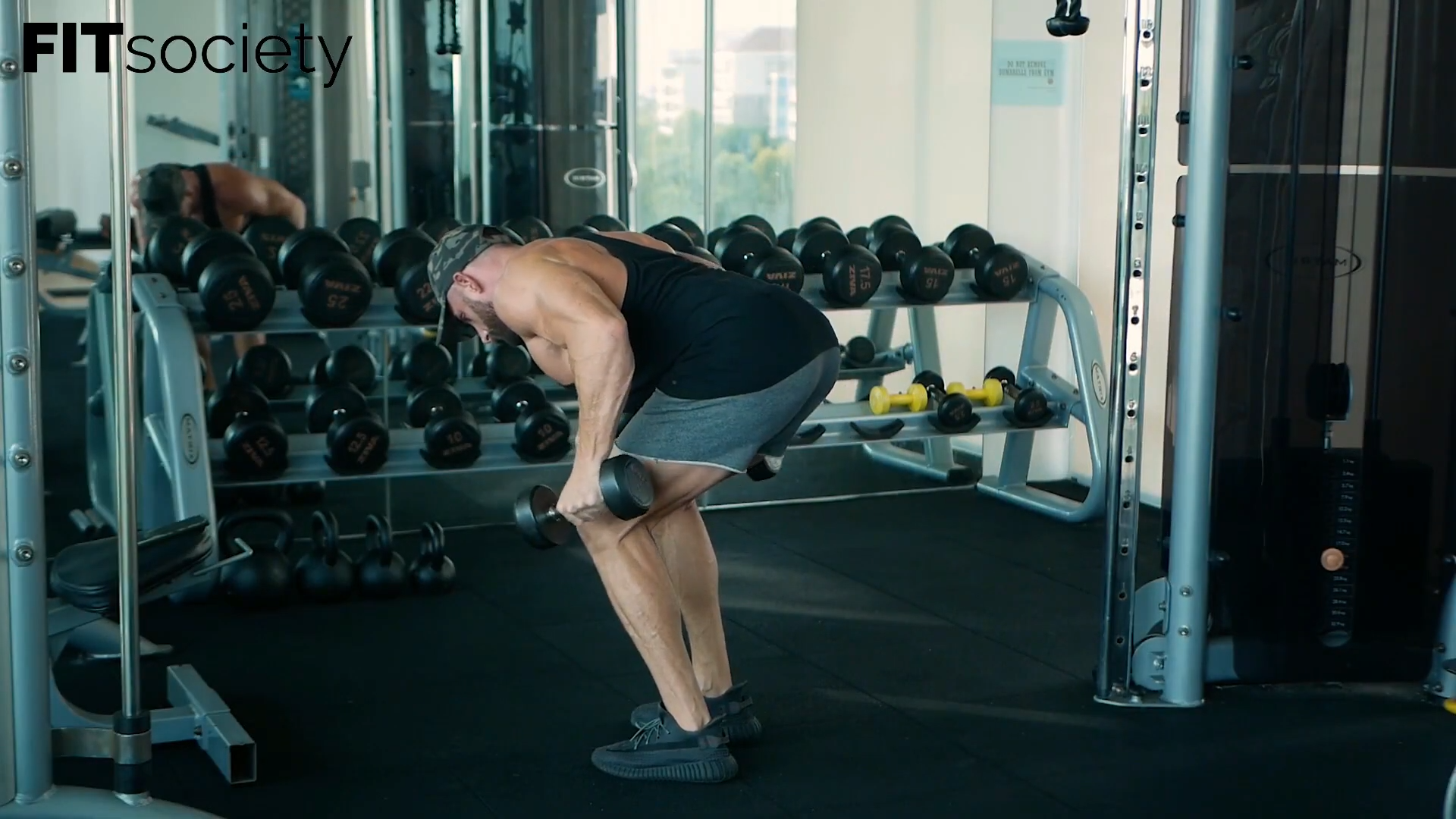 Extensions triceps avec haltères buste penché