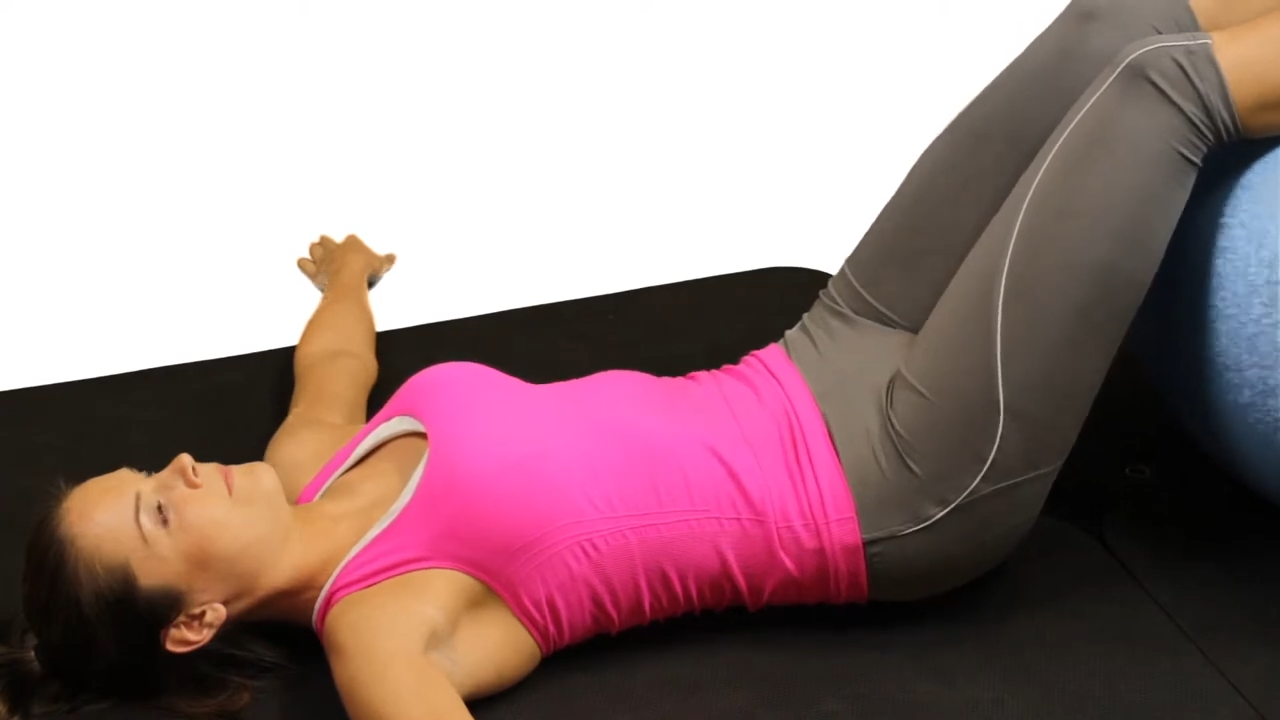 Curl de piernas con balón de estabilidad
