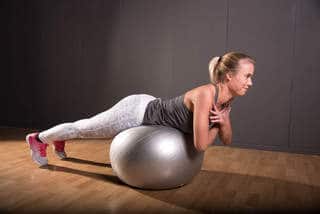Back Extension on Stability Ball, Arms Crossed