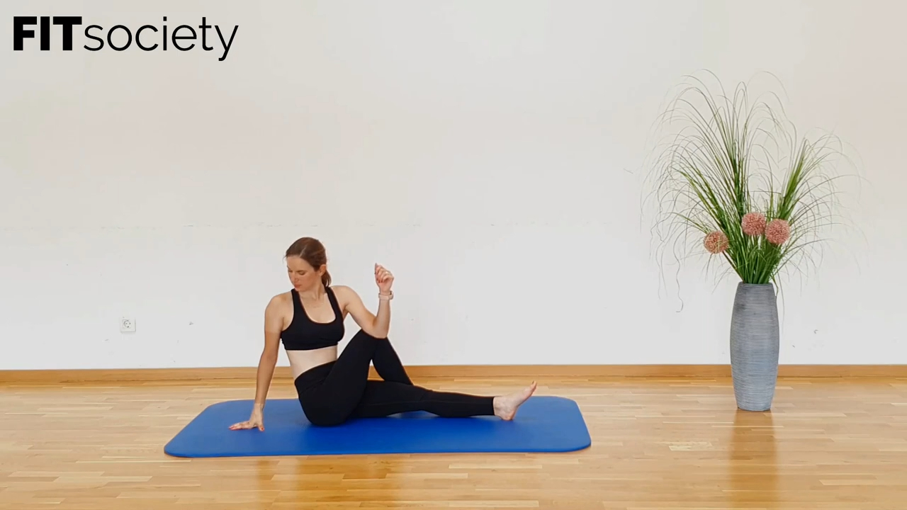 Seated Upper Body And Glute Stretch