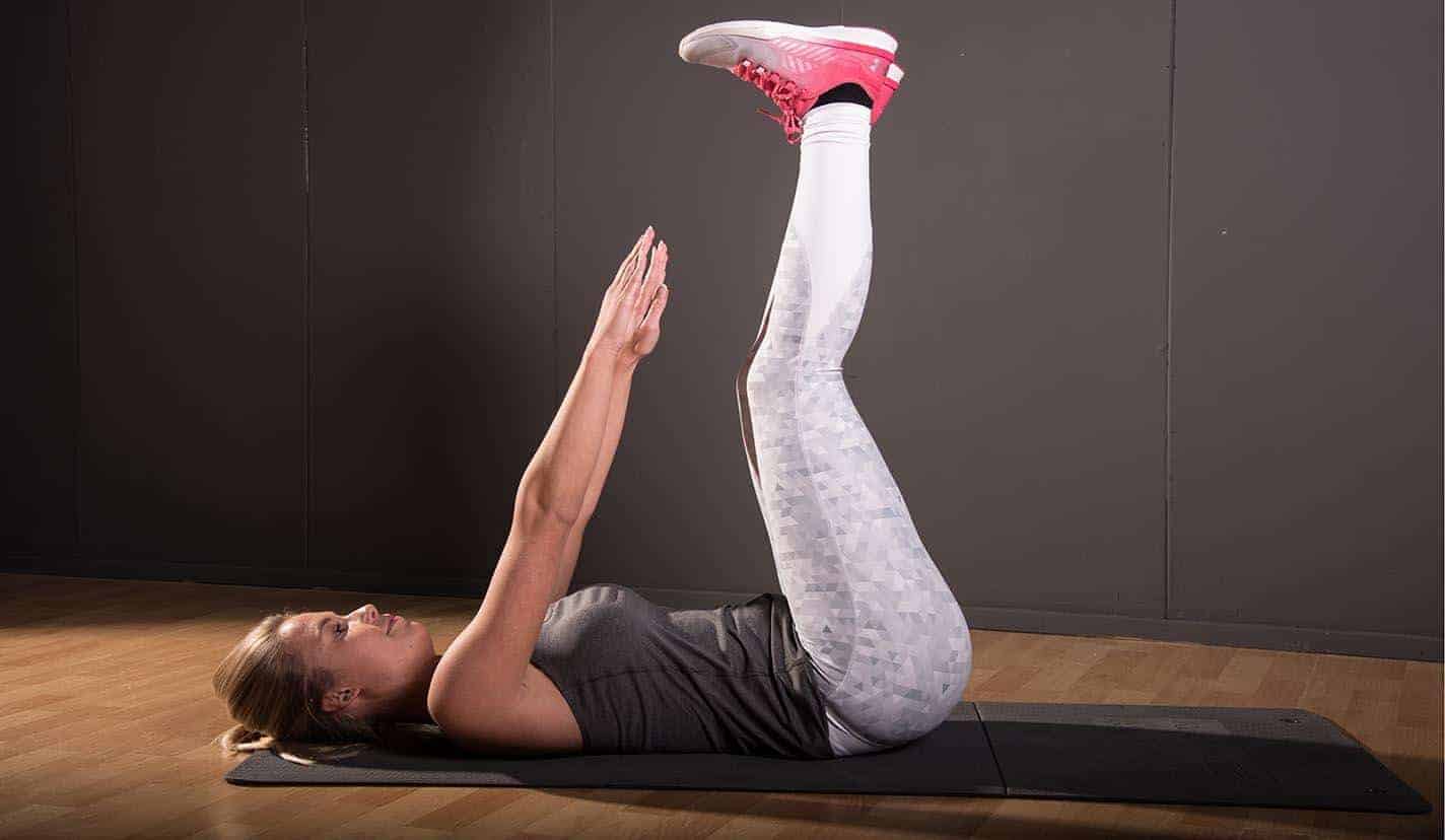 Abdominales con piernas elevadas